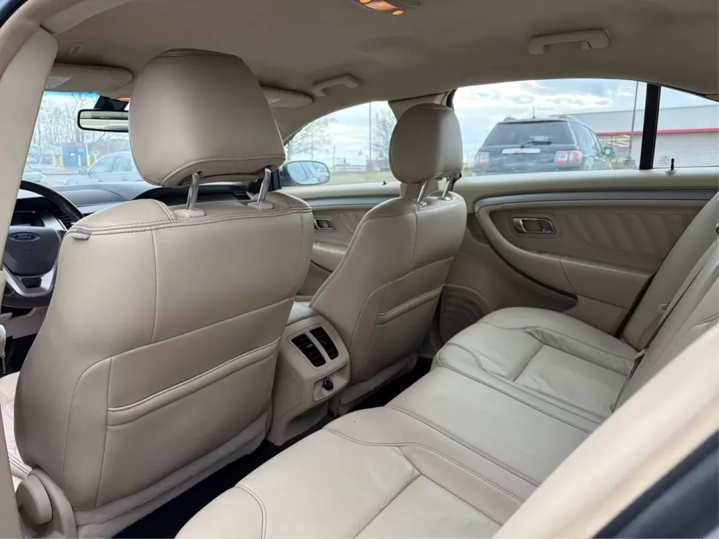 2013 Ford Taurus SEL (1FAHP2H87DG) with an 3.5L V-6 DOHC engine, 6-Speed Automatic transmission, located at 1099 N County Rd 25A , Troy, OH, 45373, (937) 908-9800, 40.057079, -84.212883 - **Discover the Perfect Family Sedan: 2013 Ford Taurus SEL at Advantage Car and Credit - Piqua, OH**<br /> <br /> Are you searching for a reliable and spacious vehicle that fits seamlessly into your family's lifestyle? Look no further than this 2013 Ford Taurus SEL, available now at Advantage Car and - Photo#10