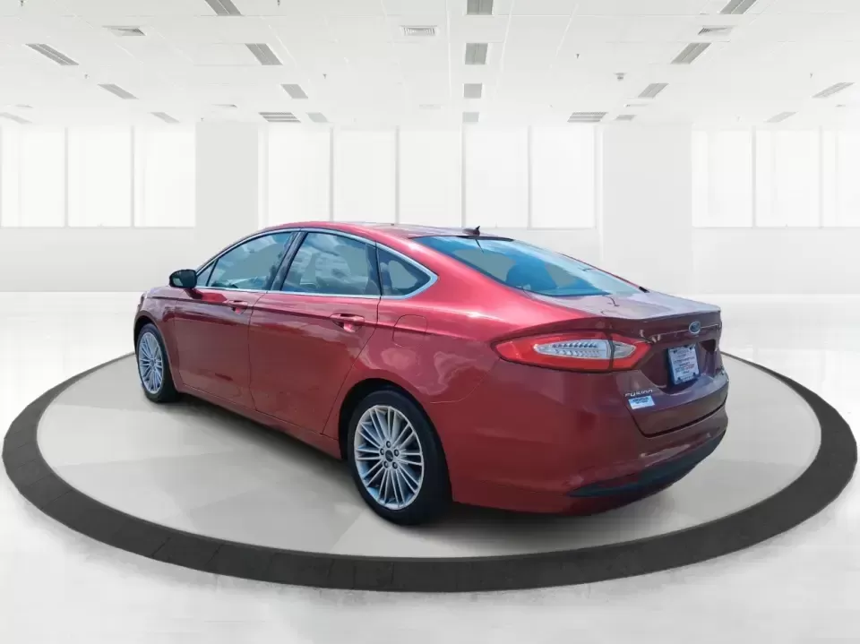 2016 Ford Fusion SE (3FA6P0HD7GR) with an 1.5L L4 DOHC 16V engine, 6-Speed Automatic transmission, located at 1099 N County Rd 25A , Troy, OH, 45373, (937) 908-9800, 40.057079, -84.212883 - Experience the perfect blend of style, comfort, and reliability with this 2016 Ford Fusion SE, available now at Advantage Car and Credit in Fairborn, OH. Whether you're a commuter navigating the busy streets of downtown Fairborn or a growing family looking for a dependable vehicle for your weekend a - Photo#4