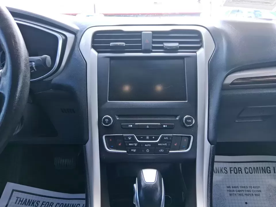 2016 Ford Fusion SE (3FA6P0HD7GR) with an 1.5L L4 DOHC 16V engine, 6-Speed Automatic transmission, located at 1099 N County Rd 25A , Troy, OH, 45373, (937) 908-9800, 40.057079, -84.212883 - Experience the perfect blend of style, comfort, and reliability with this 2016 Ford Fusion SE, available now at Advantage Car and Credit in Fairborn, OH. Whether you're a commuter navigating the busy streets of downtown Fairborn or a growing family looking for a dependable vehicle for your weekend a - Photo#13