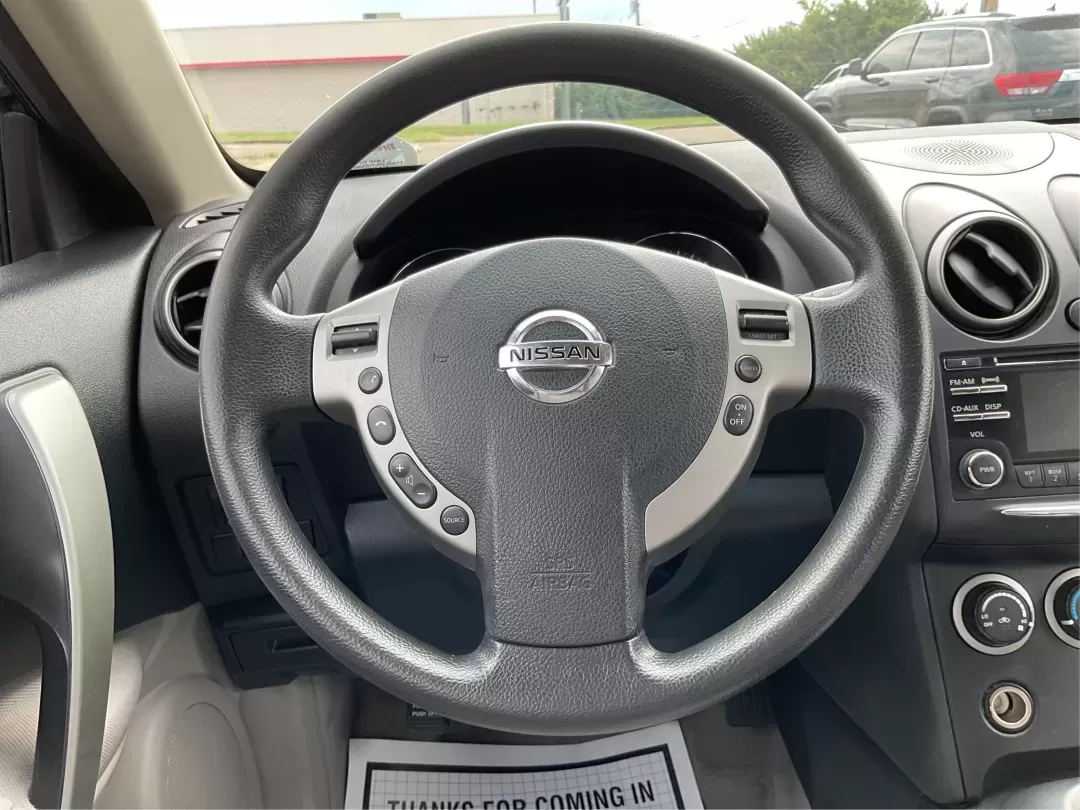 2013 Nissan Rogue SV (JN8AS5MV2DW) with an 2.5L I-4 DOHC engine, Continuously Variable Transmission transmission, located at 1951 S Dayton Lakeview Rd., New Carlisle, OH, 45344, (937) 908-9800, 39.890999, -84.050255 - **Experience Adventure with This 2013 Nissan Rogue SV at Advantage Car and Credit - Piqua!**<br /> <br /> Are you ready to embark on your next road trip or tackle your daily commute with confidence? The 2013 Nissan Rogue SV is perfect for budget-conscious buyers and growing families alike, offering - Photo#16