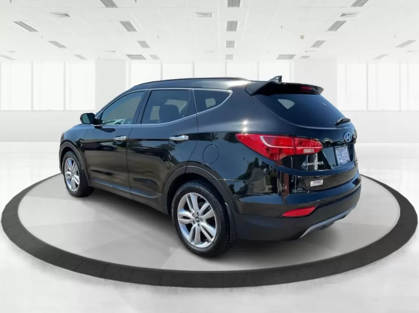 2014 Hyundai Santa Fe 2.0L Turbo (5XYZUDLA5EG) with an Theta II 2L I-4 gasoline direct injection engine, located at 8750 N County Rd 25A, Piqua, OH, 45356, (937) 908-9800, 40.164391, -84.232513 - Experience the thrill of adventure and family outings with our stunning 2014 Hyundai Santa Fe, available now at Advantage Car and Credit - Piqua, your friendly Buy Here Pay Here dealership located at 8750 N County Rd 25A, Piqua, OH 45356. This versatile SUV is designed for those who crave comfort, r - Photo#4