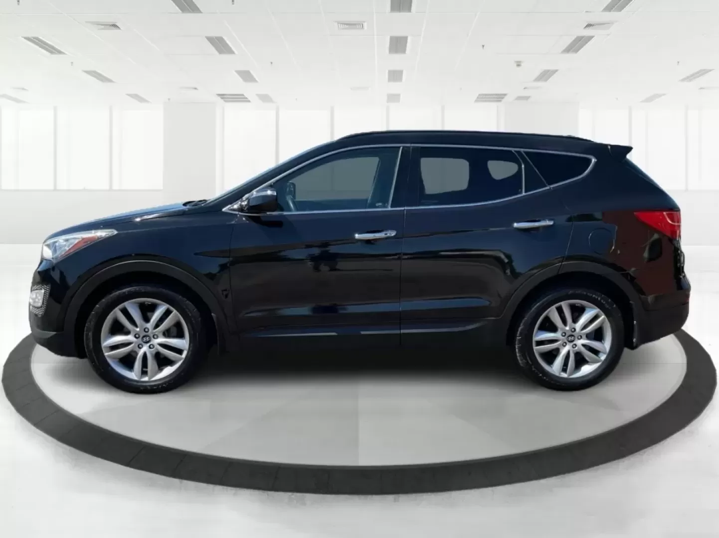 2014 Hyundai Santa Fe 2.0L Turbo (5XYZUDLA5EG) with an Theta II 2L I-4 gasoline direct injection engine, located at 8750 N County Rd 25A, Piqua, OH, 45356, (937) 908-9800, 40.164391, -84.232513 - Experience the thrill of adventure and family outings with our stunning 2014 Hyundai Santa Fe, available now at Advantage Car and Credit - Piqua, your friendly Buy Here Pay Here dealership located at 8750 N County Rd 25A, Piqua, OH 45356. This versatile SUV is designed for those who crave comfort, r - Photo#5