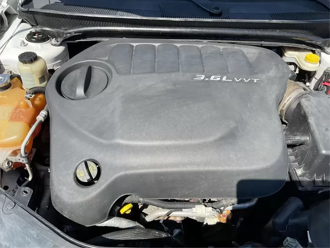 2012 Chrysler 200 Touring (1C3CCBBG4CN) with an 3.6L V6 DOHC 24V FFV engine, 6-Speed Automatic transmission, located at 1230 East Main St, Xenia, OH, 45385, (937) 908-9800, 39.688026, -83.910172 - Unleash your driving potential with the perfect blend of style, comfort, and functionality-ideal for growing families or anyone seeking a reliable commuter vehicle. Introducing the 2012 Chrysler 200 Touring sedan, now available at Advantage Car and Credit in Troy, OH. Located at 1099 N County Rd 25A - Photo#11