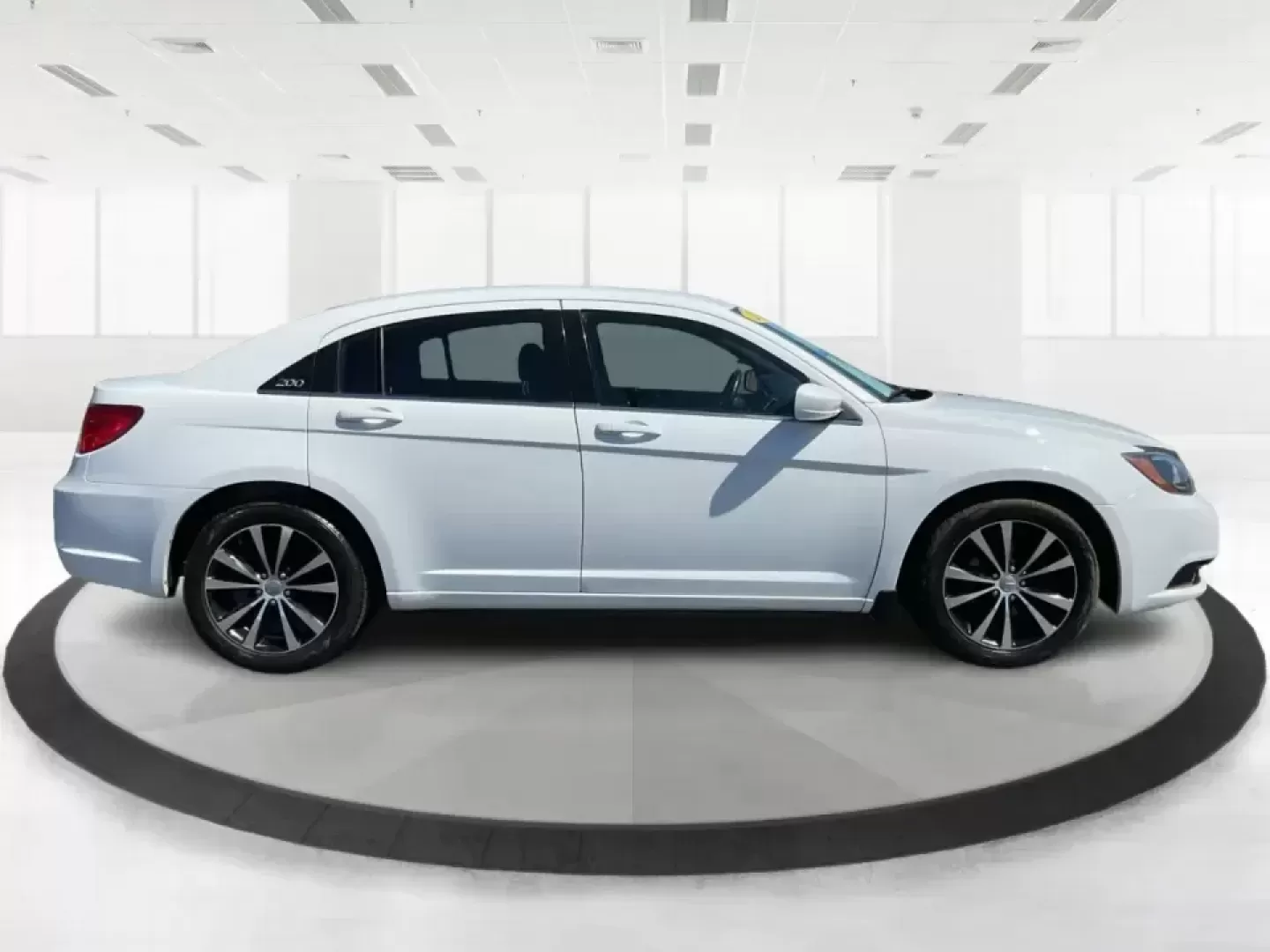 2012 Chrysler 200 Touring (1C3CCBBG4CN) with an 3.6L V6 DOHC 24V FFV engine, 6-Speed Automatic transmission, located at 1230 East Main St, Xenia, OH, 45385, (937) 908-9800, 39.688026, -83.910172 - Unleash your driving potential with the perfect blend of style, comfort, and functionality-ideal for growing families or anyone seeking a reliable commuter vehicle. Introducing the 2012 Chrysler 200 Touring sedan, now available at Advantage Car and Credit in Troy, OH. Located at 1099 N County Rd 25A - Photo#1