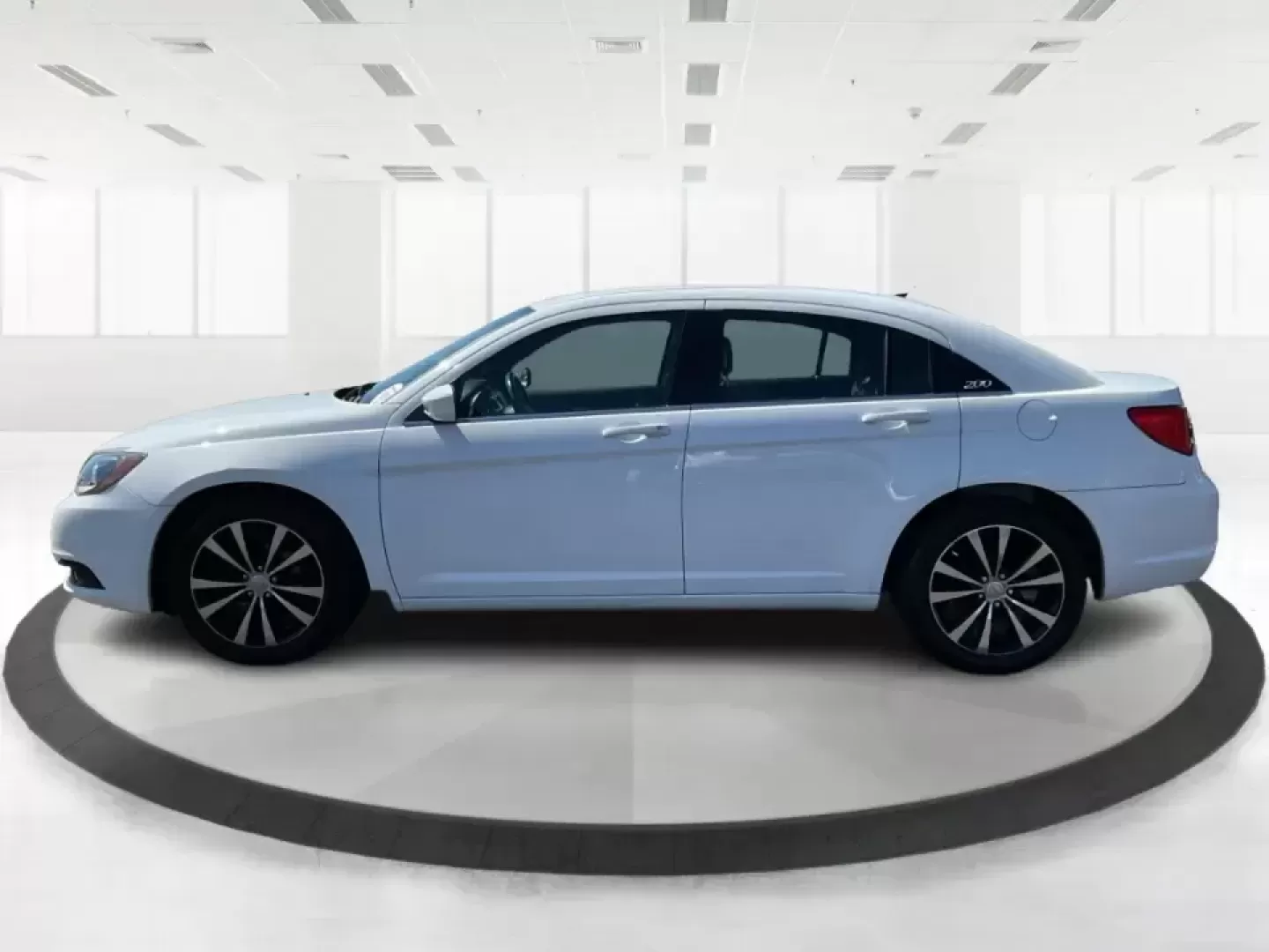 2012 Chrysler 200 Touring (1C3CCBBG4CN) with an 3.6L V6 DOHC 24V FFV engine, 6-Speed Automatic transmission, located at 1230 East Main St, Xenia, OH, 45385, (937) 908-9800, 39.688026, -83.910172 - Unleash your driving potential with the perfect blend of style, comfort, and functionality-ideal for growing families or anyone seeking a reliable commuter vehicle. Introducing the 2012 Chrysler 200 Touring sedan, now available at Advantage Car and Credit in Troy, OH. Located at 1099 N County Rd 25A - Photo#5