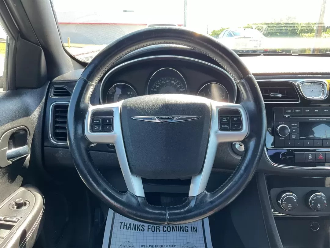 2012 Chrysler 200 Touring (1C3CCBBG4CN) with an Other engine, located at 1099 N County Rd 25A , Troy, OH, 45373, (937) 908-9800, 40.057079, -84.212883 - Unleash your driving potential with the perfect blend of style, comfort, and functionality-ideal for growing families or anyone seeking a reliable commuter vehicle. Introducing the 2012 Chrysler 200 Touring sedan, now available at Advantage Car and Credit in Troy, OH. Located at 1099 N County Rd 25A - Photo#16