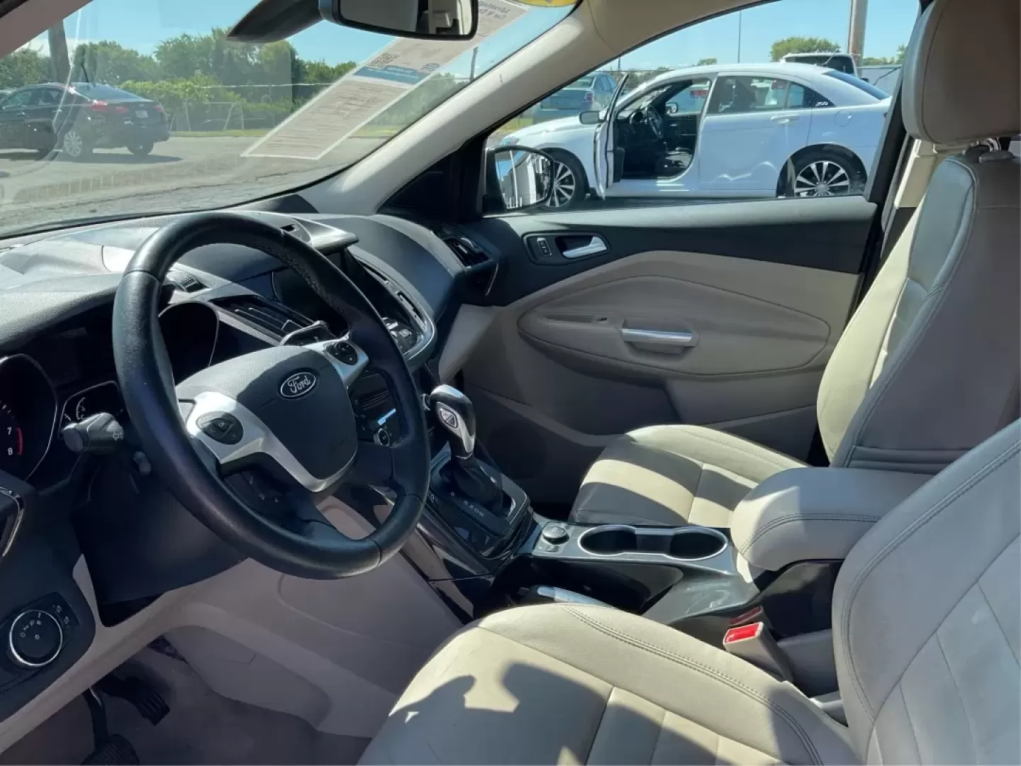 2014 Ford Escape Titanium (1FMCU9J91EU) with an Other engine, located at 1230 East Main St, Xenia, OH, 45385, (937) 908-9800, 39.688026, -83.910172 - **Explore the Open Road with Confidence in This 2014 Ford Escape Titanium!**<br /> <br /> Are you ready to elevate your adventures with a reliable SUV that meets the diverse needs of your lifestyle? The 2014 Ford Escape Titanium is the ideal vehicle for families, commuters, and weekend warriors alik - Photo#9