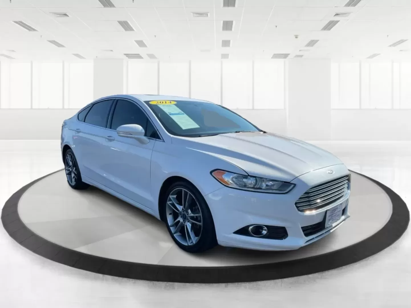 2014 Ford Fusion Titanium (3FA6P0D93ER) with an EcoBoost 2L I-4 gasoline direct injection engine, located at 4508 South Dixie Dr, Moraine, OH, 45439, (937) 908-9800, 39.689976, -84.218452 - Are you ready to elevate your daily commute or make unforgettable memories on family road trips? Introducing the stunning 2014 Ford Fusion Titanium, now available at Advantage Car and Credit in Moraine, OH. This sleek sedan seamlessly blends style, comfort, and performance, making it an ideal choice - Photo#0