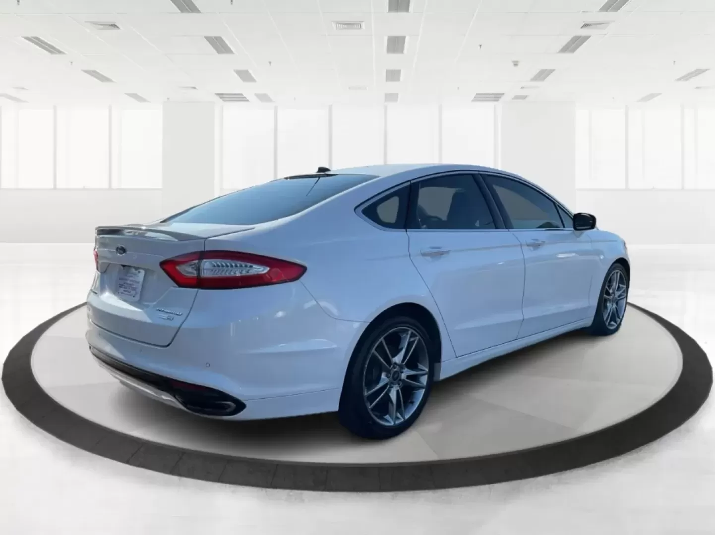 2014 Ford Fusion Titanium (3FA6P0D93ER) with an EcoBoost 2L I-4 gasoline direct injection engine, located at 4508 South Dixie Dr, Moraine, OH, 45439, (937) 908-9800, 39.689976, -84.218452 - Are you ready to elevate your daily commute or make unforgettable memories on family road trips? Introducing the stunning 2014 Ford Fusion Titanium, now available at Advantage Car and Credit in Moraine, OH. This sleek sedan seamlessly blends style, comfort, and performance, making it an ideal choice - Photo#2