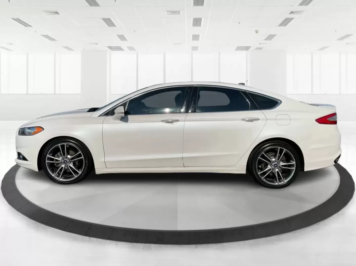 2014 Ford Fusion Titanium (3FA6P0D93ER) with an EcoBoost 2L I-4 gasoline direct injection engine, located at 4508 South Dixie Dr, Moraine, OH, 45439, (937) 908-9800, 39.689976, -84.218452 - Are you ready to elevate your daily commute or make unforgettable memories on family road trips? Introducing the stunning 2014 Ford Fusion Titanium, now available at Advantage Car and Credit in Moraine, OH. This sleek sedan seamlessly blends style, comfort, and performance, making it an ideal choice - Photo#5