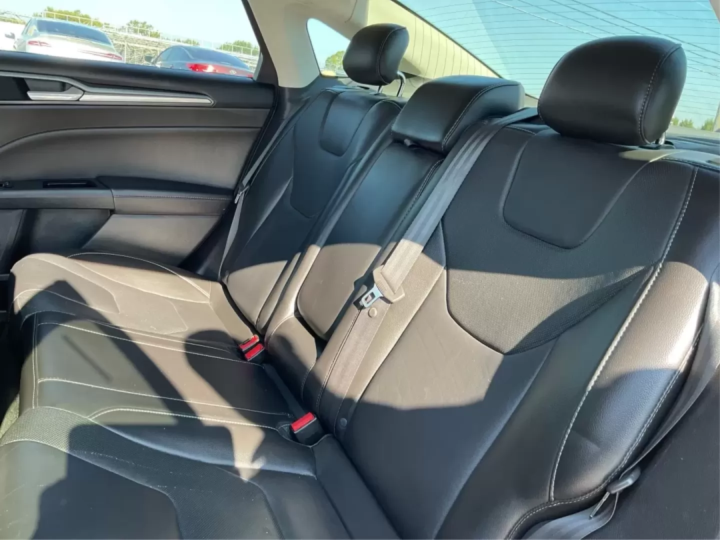 2014 Ford Fusion Titanium (3FA6P0D93ER) with an EcoBoost 2L I-4 gasoline direct injection engine, located at 4508 South Dixie Dr, Moraine, OH, 45439, (937) 908-9800, 39.689976, -84.218452 - Are you ready to elevate your daily commute or make unforgettable memories on family road trips? Introducing the stunning 2014 Ford Fusion Titanium, now available at Advantage Car and Credit in Moraine, OH. This sleek sedan seamlessly blends style, comfort, and performance, making it an ideal choice - Photo#10