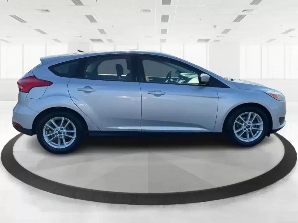 2018 Ford Focus SE Hatch (1FADP3K23JL) with an 2.0L L4 DOHC 16V engine, Automatic transmission, located at 8750 N County Rd 25A, Piqua, OH, 45356, (937) 908-9800, 40.164391, -84.232513 - Busy weekdays, long commutes up I75, and quick weekend getaways to the Great Miami River Trail call for a car that's easy to live with, easy to park, and efficient to run. This 2018 Ford Focus SE Hatchback in Ingot Silver Metallic fits that lifestyle with the versatility of a hatch, the confidence o - Photo#1