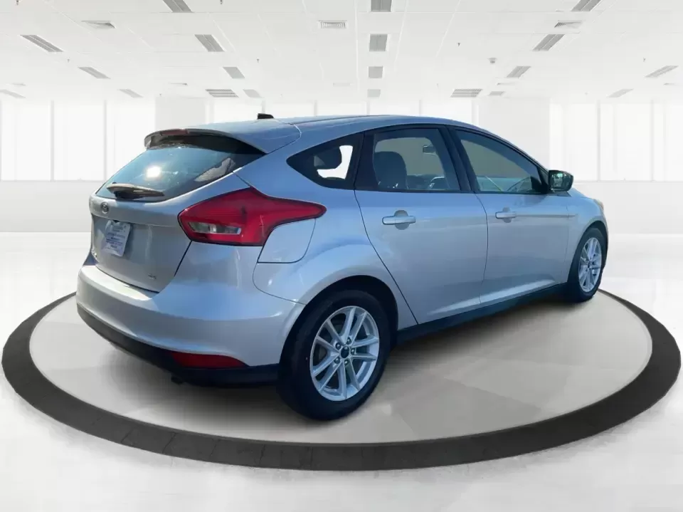 2018 Ford Focus SE Hatch (1FADP3K23JL) with an 2.0L L4 DOHC 16V engine, Automatic transmission, located at 8750 N County Rd 25A, Piqua, OH, 45356, (937) 908-9800, 40.164391, -84.232513 - Busy weekdays, long commutes up I75, and quick weekend getaways to the Great Miami River Trail call for a car that's easy to live with, easy to park, and efficient to run. This 2018 Ford Focus SE Hatchback in Ingot Silver Metallic fits that lifestyle with the versatility of a hatch, the confidence o - Photo#2