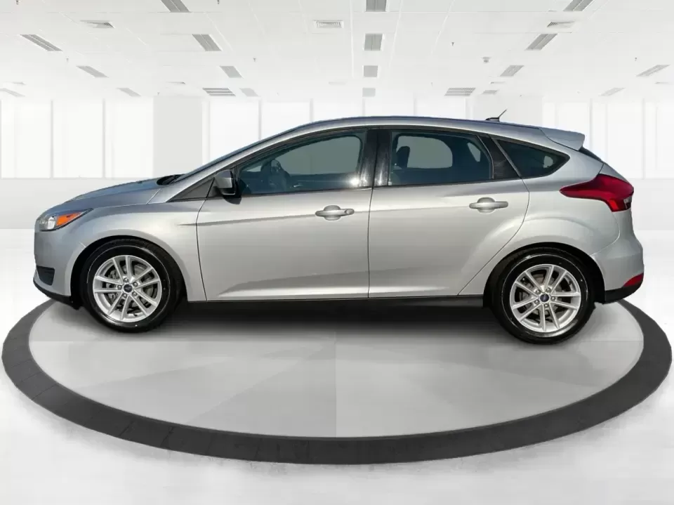 2018 Ford Focus SE Hatch (1FADP3K23JL) with an 2.0L L4 DOHC 16V engine, Automatic transmission, located at 8750 N County Rd 25A, Piqua, OH, 45356, (937) 908-9800, 40.164391, -84.232513 - Busy weekdays, long commutes up I75, and quick weekend getaways to the Great Miami River Trail call for a car that's easy to live with, easy to park, and efficient to run. This 2018 Ford Focus SE Hatchback in Ingot Silver Metallic fits that lifestyle with the versatility of a hatch, the confidence o - Photo#5