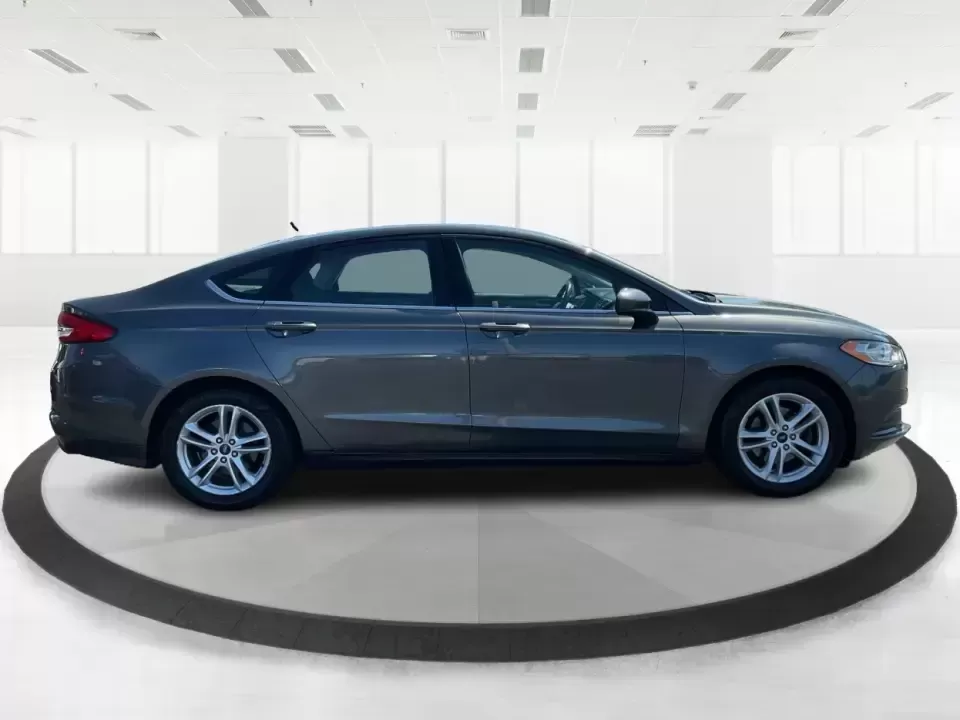 2018 Ford Fusion SE (3FA6P0HD3JR) with an 1.5L L4 DOHC 16V engine, 6A transmission, located at 1184 Kauffman Ave, Fairborn, OH, 45324, (937) 908-9800, 39.807072, -84.030914 - Looking for a reliable sedan that combines style, comfort, and practicality? Look no further than the 2018 Ford Fusion SE, available now at Advantage Car and Credit in Vandalia, OH! Perfect for your daily commute, family outings, or even weekend adventures, this vehicle is designed to enhance your l - Photo#1