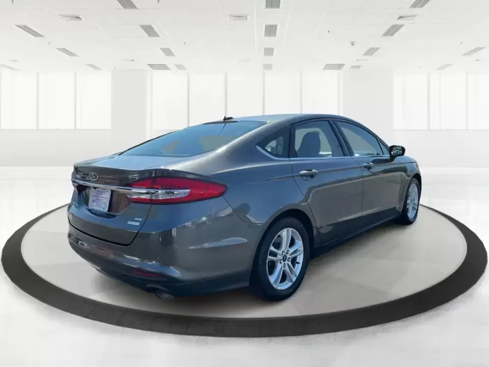 2018 Ford Fusion SE (3FA6P0HD3JR) with an 1.5L L4 DOHC 16V engine, 6A transmission, located at 1184 Kauffman Ave, Fairborn, OH, 45324, (937) 908-9800, 39.807072, -84.030914 - Looking for a reliable sedan that combines style, comfort, and practicality? Look no further than the 2018 Ford Fusion SE, available now at Advantage Car and Credit in Vandalia, OH! Perfect for your daily commute, family outings, or even weekend adventures, this vehicle is designed to enhance your l - Photo#2