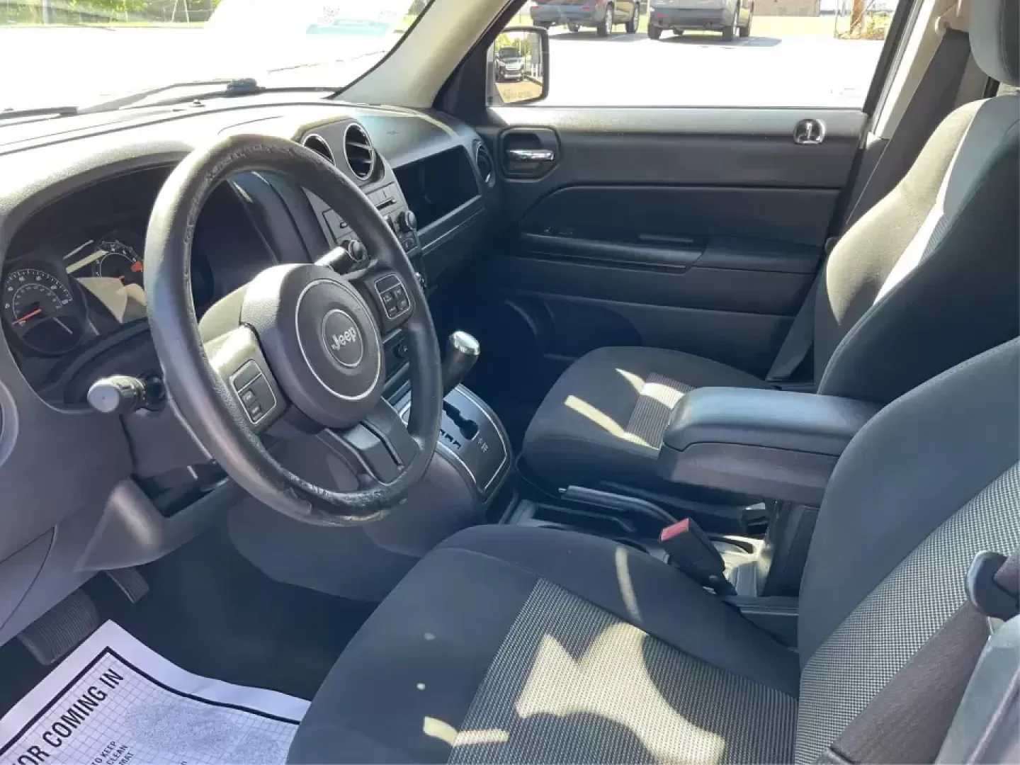 2016 Jeep Patriot Sport (1C4NJPBA0GD) with an 2.0L L4 DOHC 16V engine, Automatic transmission, located at 4508 South Dixie Dr, Moraine, OH, 45439, (937) 908-9800, 39.689976, -84.218452 - Picture your next Ohio weekend: a quick commute up South Dixie Drive, a grocery run near the Dayton Mall area, then an easy escape to Twin Creek MetroPark or a day trip into downtown Dayton-without driving something oversized or hard on your budget. This 2016 Jeep Patriot Sport is the kind of compac - Photo#9