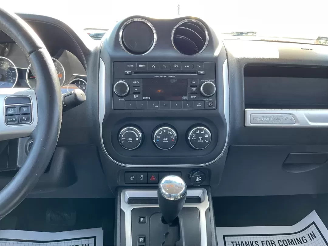 2016 Jeep Compass High Altitude Edition (1C4NJCEA0GD) with an 2L I-4 DOHC engine, located at 1951 S Dayton Lakeview Rd., New Carlisle, OH, 45344, (937) 908-9800, 39.890999, -84.050255 - Experience the thrill of adventure with the 2016 Jeep Compass High Altitude Edition, a versatile SUV designed for those who crave both comfort and capability. Whether you're a growing family seeking reliable transportation, a commuter navigating Riverside's bustling streets, or simply someone who en - Photo#13