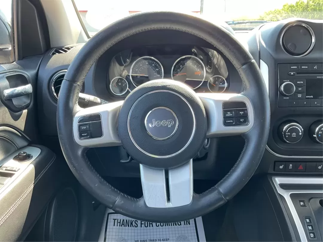 2016 Jeep Compass High Altitude Edition (1C4NJCEA0GD) with an 2L I-4 DOHC engine, located at 1951 S Dayton Lakeview Rd., New Carlisle, OH, 45344, (937) 908-9800, 39.890999, -84.050255 - Experience the thrill of adventure with the 2016 Jeep Compass High Altitude Edition, a versatile SUV designed for those who crave both comfort and capability. Whether you're a growing family seeking reliable transportation, a commuter navigating Riverside's bustling streets, or simply someone who en - Photo#16