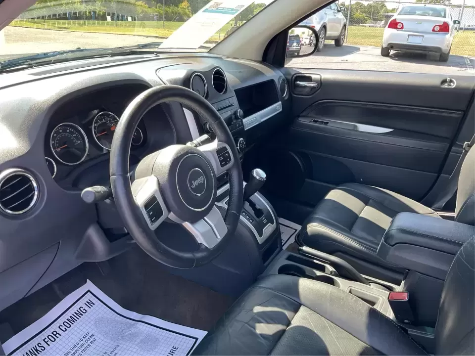 2016 Jeep Compass High Altitude Edition (1C4NJCEA0GD) with an 2L I-4 DOHC engine, CVT transmission, located at 8750 N County Rd 25A, Piqua, OH, 45356, (937) 908-9800, 40.164391, -84.232513 - Experience the thrill of adventure with the 2016 Jeep Compass High Altitude Edition, a versatile SUV designed for those who crave both comfort and capability. Whether you're a growing family seeking reliable transportation, a commuter navigating Riverside's bustling streets, or simply someone who en - Photo#9