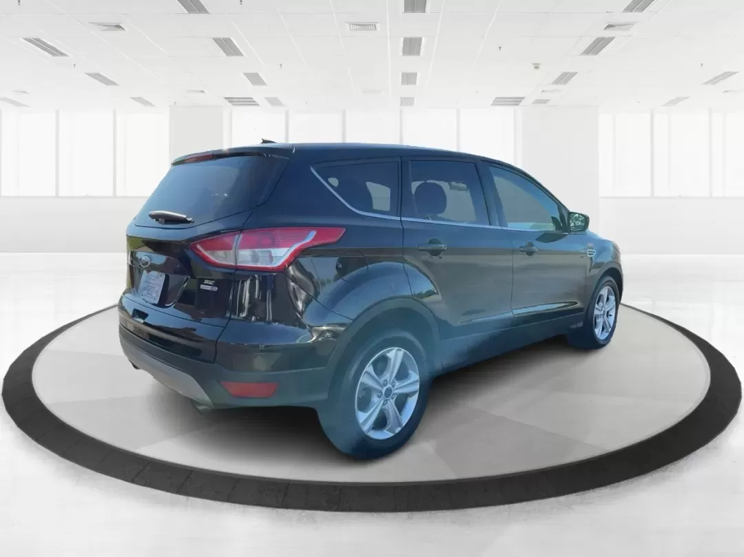 2016 Ford Escape SE (1FMCU9G92GU) with an 2.0L L4 DOHC 16V engine, 6-Speed Automatic transmission, located at 1230 East Main St, Xenia, OH, 45385, (937) 908-9800, 39.688026, -83.910172 - **Adventure Awaits with the 2016 Ford Escape SE at Advantage Car and Credit - New Carlisle!**<br /> <br /> Are you ready to elevate your lifestyle with a vehicle that can handle both your daily commutes and weekend getaways? Look no further than this stunning 2016 Ford Escape SE, available now at Ad - Photo#2