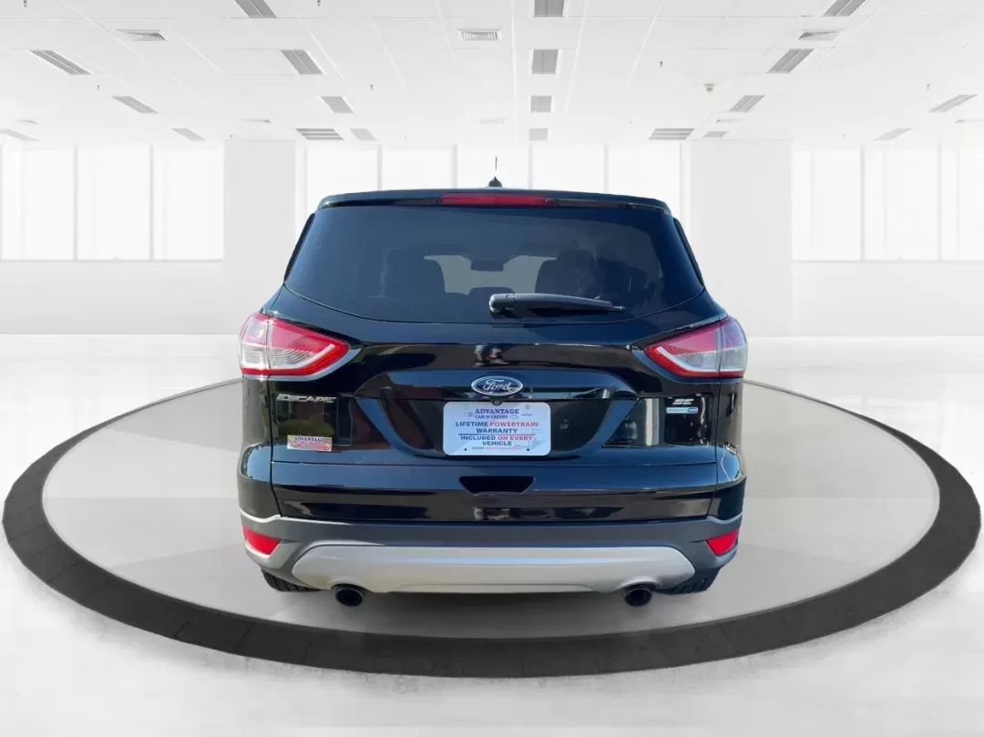 2016 Ford Escape SE (1FMCU9G92GU) with an 2.0L L4 DOHC 16V engine, 6-Speed Automatic transmission, located at 1230 East Main St, Xenia, OH, 45385, (937) 908-9800, 39.688026, -83.910172 - **Adventure Awaits with the 2016 Ford Escape SE at Advantage Car and Credit - New Carlisle!**<br /> <br /> Are you ready to elevate your lifestyle with a vehicle that can handle both your daily commutes and weekend getaways? Look no further than this stunning 2016 Ford Escape SE, available now at Ad - Photo#3