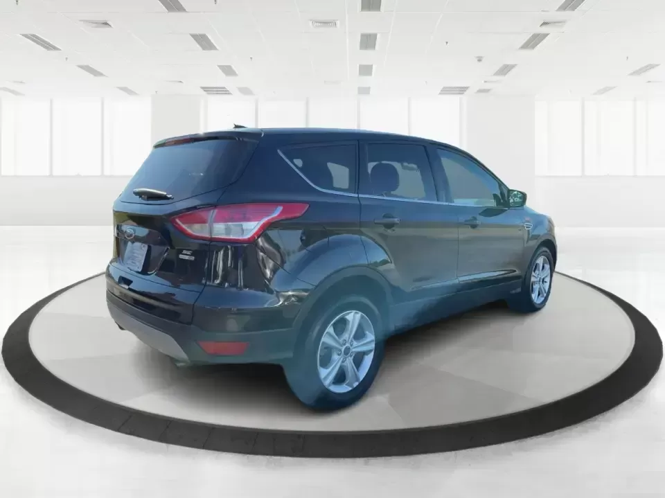 2016 Ford Escape SE (1FMCU9G92GU) with an 2.0L L4 DOHC 16V engine, 6-Speed Automatic transmission, located at 1951 S Dayton Lakeview Rd., New Carlisle, OH, 45344, (937) 908-9800, 39.890999, -84.050255 - **Adventure Awaits with the 2016 Ford Escape SE at Advantage Car and Credit - New Carlisle!**<br /> <br /> Are you ready to elevate your lifestyle with a vehicle that can handle both your daily commutes and weekend getaways? Look no further than this stunning 2016 Ford Escape SE, available now at Ad - Photo#2