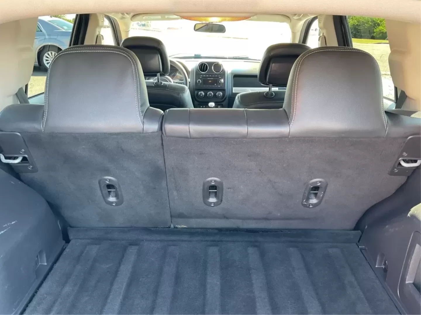 2015 Jeep Compass Altitude Edition (1C4NJCBA6FD) with an 2L I-4 DOHC engine, located at 8750 N County Rd 25A, Piqua, OH, 45356, (937) 908-9800, 40.164391, -84.232513 - **Adventure Awaits in the 2015 Jeep Compass Altitude Edition at Advantage Car and Credit - Fairborn!**<br /> <br /> Are you ready for your next adventure? The 2015 Jeep Compass Altitude Edition is your perfect companion for weekend getaways, family road trips, or even your daily commute! This versat - Photo#12