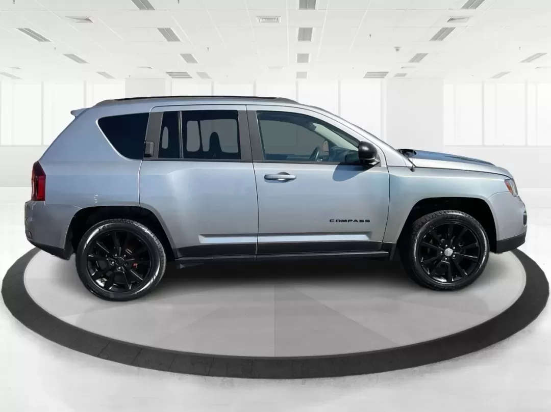 2015 Jeep Compass Altitude Edition (1C4NJCBA6FD) with an 2L I-4 DOHC engine, Continuously Variable Transmission (CVT) transmission, located at 880 E. National Road, Vandalia, OH, 45377, (937) 908-9800, 39.891918, -84.183594 - **Adventure Awaits in the 2015 Jeep Compass Altitude Edition at Advantage Car and Credit - Fairborn!**<br /> <br /> Are you ready for your next adventure? The 2015 Jeep Compass Altitude Edition is your perfect companion for weekend getaways, family road trips, or even your daily commute! This versat - Photo#1