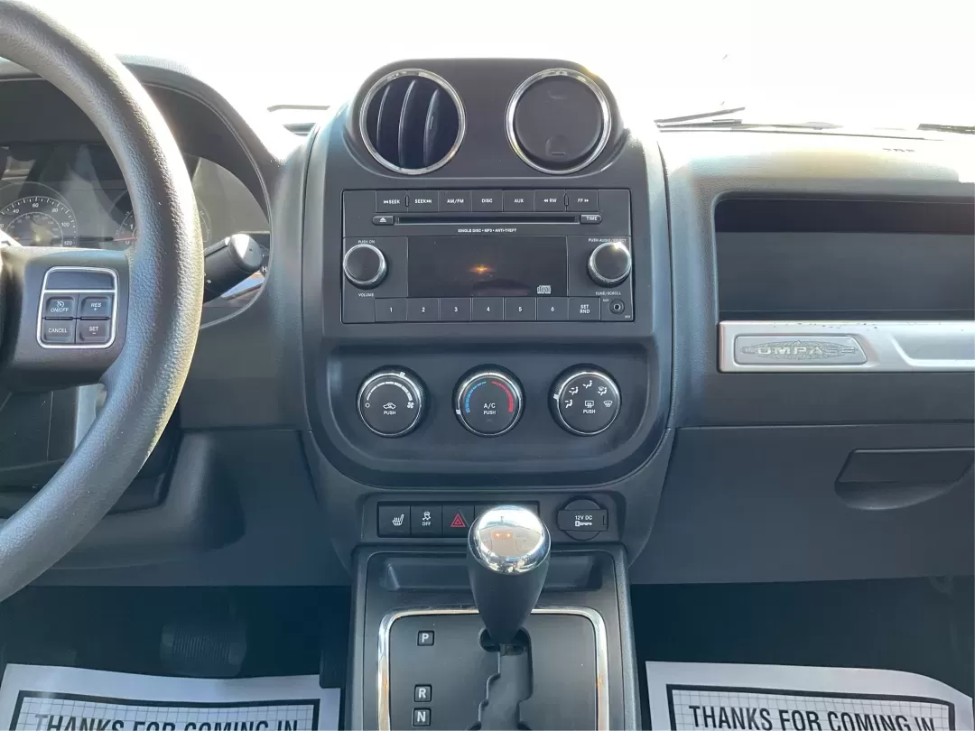 2015 Jeep Compass Altitude Edition (1C4NJCBA6FD) with an 2L I-4 DOHC engine, Continuously Variable Transmission (CVT) transmission, located at 880 E. National Road, Vandalia, OH, 45377, (937) 908-9800, 39.891918, -84.183594 - **Adventure Awaits in the 2015 Jeep Compass Altitude Edition at Advantage Car and Credit - Fairborn!**<br /> <br /> Are you ready for your next adventure? The 2015 Jeep Compass Altitude Edition is your perfect companion for weekend getaways, family road trips, or even your daily commute! This versat - Photo#13