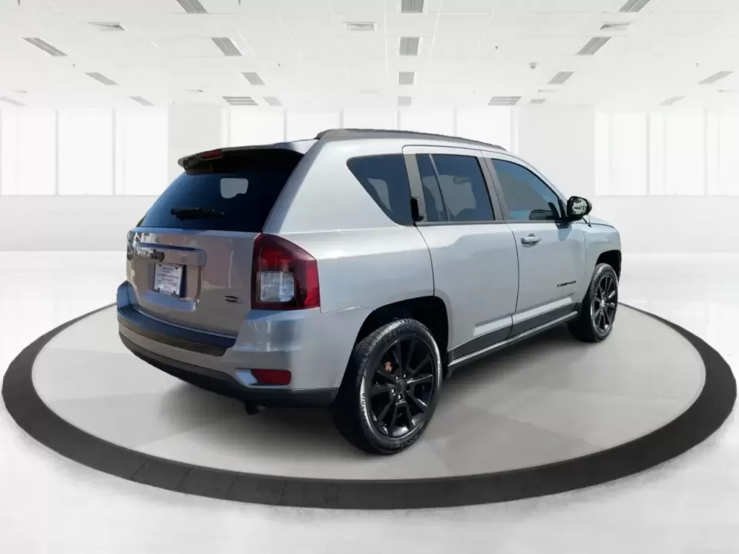 2015 Jeep Compass Altitude Edition (1C4NJCBA6FD) with an 2L I-4 DOHC engine, Continuously Variable Transmission (CVT) transmission, located at 8750 N County Rd 25A, Piqua, OH, 45356, (937) 908-9800, 40.164391, -84.232513 - **Adventure Awaits in the 2015 Jeep Compass Altitude Edition at Advantage Car and Credit - Fairborn!**<br /> <br /> Are you ready for your next adventure? The 2015 Jeep Compass Altitude Edition is your perfect companion for weekend getaways, family road trips, or even your daily commute! This versat - Photo#2
