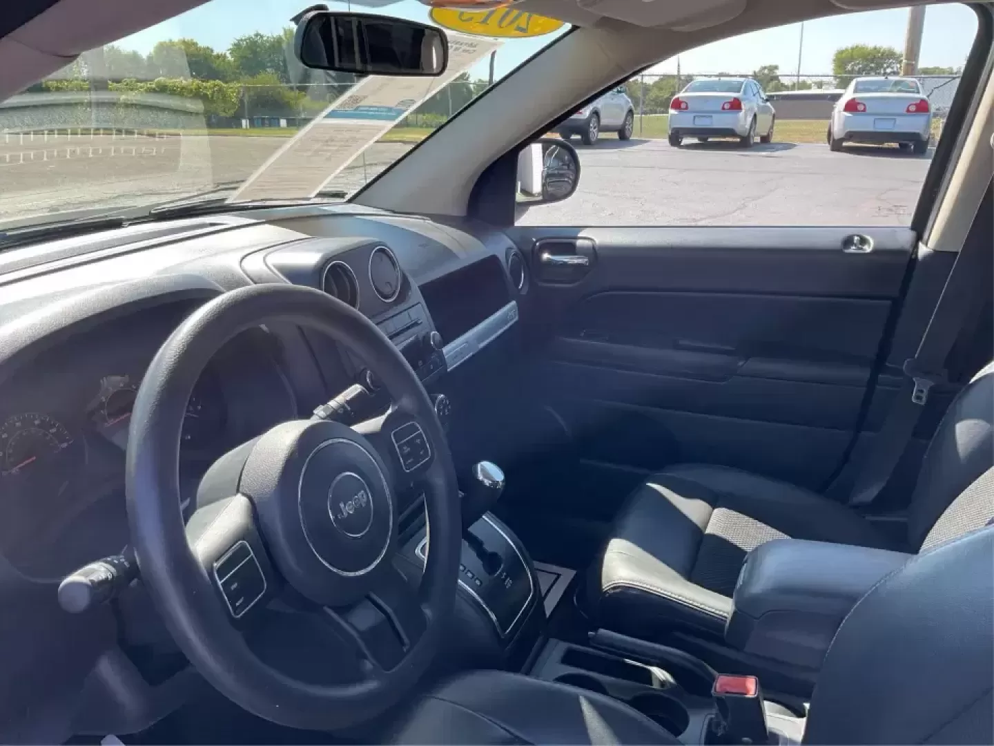 2015 Jeep Compass Altitude Edition (1C4NJCBA6FD) with an 2L I-4 DOHC engine, Continuously Variable Transmission (CVT) transmission, located at 8750 N County Rd 25A, Piqua, OH, 45356, (937) 908-9800, 40.164391, -84.232513 - **Adventure Awaits in the 2015 Jeep Compass Altitude Edition at Advantage Car and Credit - Fairborn!**<br /> <br /> Are you ready for your next adventure? The 2015 Jeep Compass Altitude Edition is your perfect companion for weekend getaways, family road trips, or even your daily commute! This versat - Photo#9