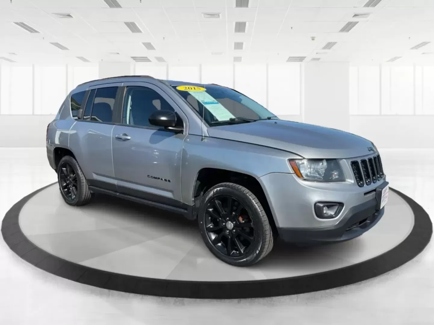 2015 Jeep Compass Altitude Edition (1C4NJCBA6FD) with an 2L I-4 DOHC engine, located at 1184 Kauffman Ave, Fairborn, OH, 45324, (937) 908-9800, 39.807072, -84.030914 - **Adventure Awaits in the 2015 Jeep Compass Altitude Edition at Advantage Car and Credit - Fairborn!**<br /> <br /> Are you ready for your next adventure? The 2015 Jeep Compass Altitude Edition is your perfect companion for weekend getaways, family road trips, or even your daily commute! This versat - Photo#0