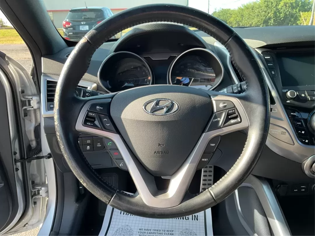 2016 Hyundai Veloster Base (KMHTC6AD4GU) with an 1.6L L4 DOHC 16V engine, 6-Speed Manual transmission, located at 401 Woodman Dr, Riverside, OH, 45431, (937) 908-9800, 39.760899, -84.123421 - **Unleash Your Adventurous Spirit with the 2016 Hyundai Veloster!**<br /> <br /> At Jamestown Auto Sales, located at 1865 W 2nd St., Xenia, OH 45385, we believe that every vehicle should match your lifestyle. If you're searching for a sporty coupe that perfectly balances style, comfort, and function - Photo#16