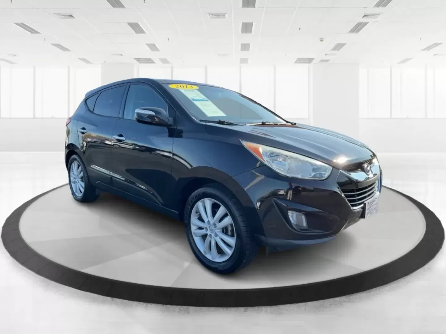 2013 Hyundai Tucson Limited (KM8JUCAC1DU) with an Theta II 2.4L I-4 DOHC engine, located at 880 E. National Road, Vandalia, OH, 45377, (937) 908-9800, 39.891918, -84.183594 - **Adventure Awaits: Discover the 2013 Hyundai Tucson Limited at Advantage Car and Credit - Vandalia!**<br /> <br /> Are you ready for your next family road trip or weekend adventure? The 2013 Hyundai Tucson Limited is here to elevate your driving experience while accommodating the needs of your life - Photo#0
