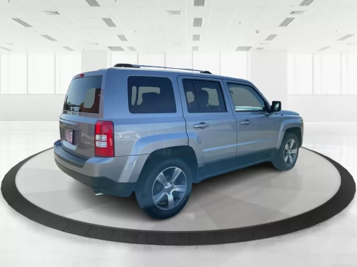2016 Jeep Patriot High Altitude Edition (1C4NJPFA3GD) with an 2L I-4 DOHC engine, located at 1951 S Dayton Lakeview Rd., New Carlisle, OH, 45344, (937) 908-9800, 39.890999, -84.050255 - Explore the open roads and off-the-beaten-path adventures with this stunning 2016 Jeep Patriot High Altitude Edition, available now at Advantage Car and Credit in New Carlisle, OH. If you're a weekend warrior looking for a reliable and versatile SUV that accommodates your active lifestyle, this Jeep - Photo#2