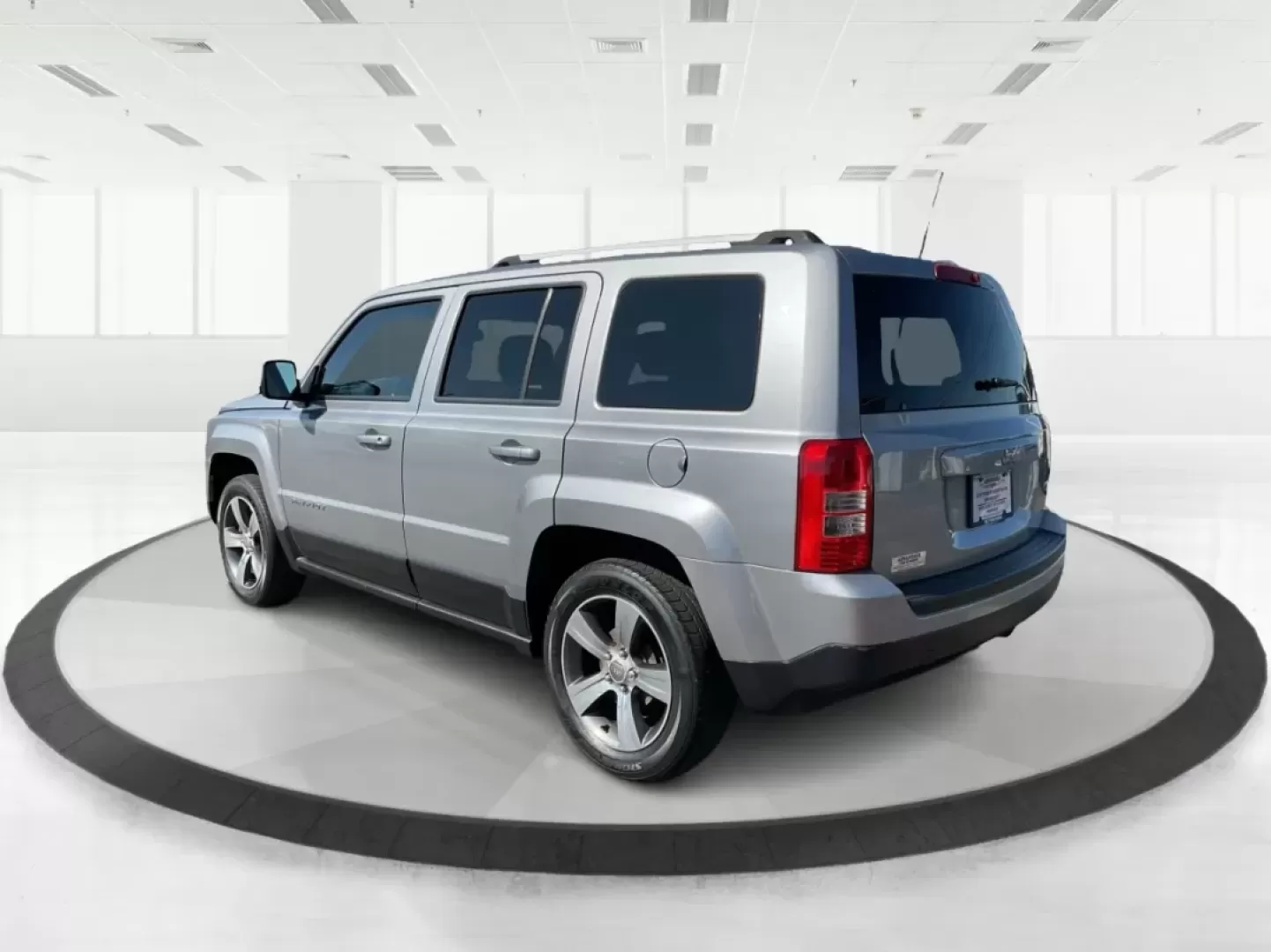 2016 Jeep Patriot High Altitude Edition (1C4NJPFA3GD) with an 2L I-4 DOHC engine, located at 1951 S Dayton Lakeview Rd., New Carlisle, OH, 45344, (937) 908-9800, 39.890999, -84.050255 - Explore the open roads and off-the-beaten-path adventures with this stunning 2016 Jeep Patriot High Altitude Edition, available now at Advantage Car and Credit in New Carlisle, OH. If you're a weekend warrior looking for a reliable and versatile SUV that accommodates your active lifestyle, this Jeep - Photo#4
