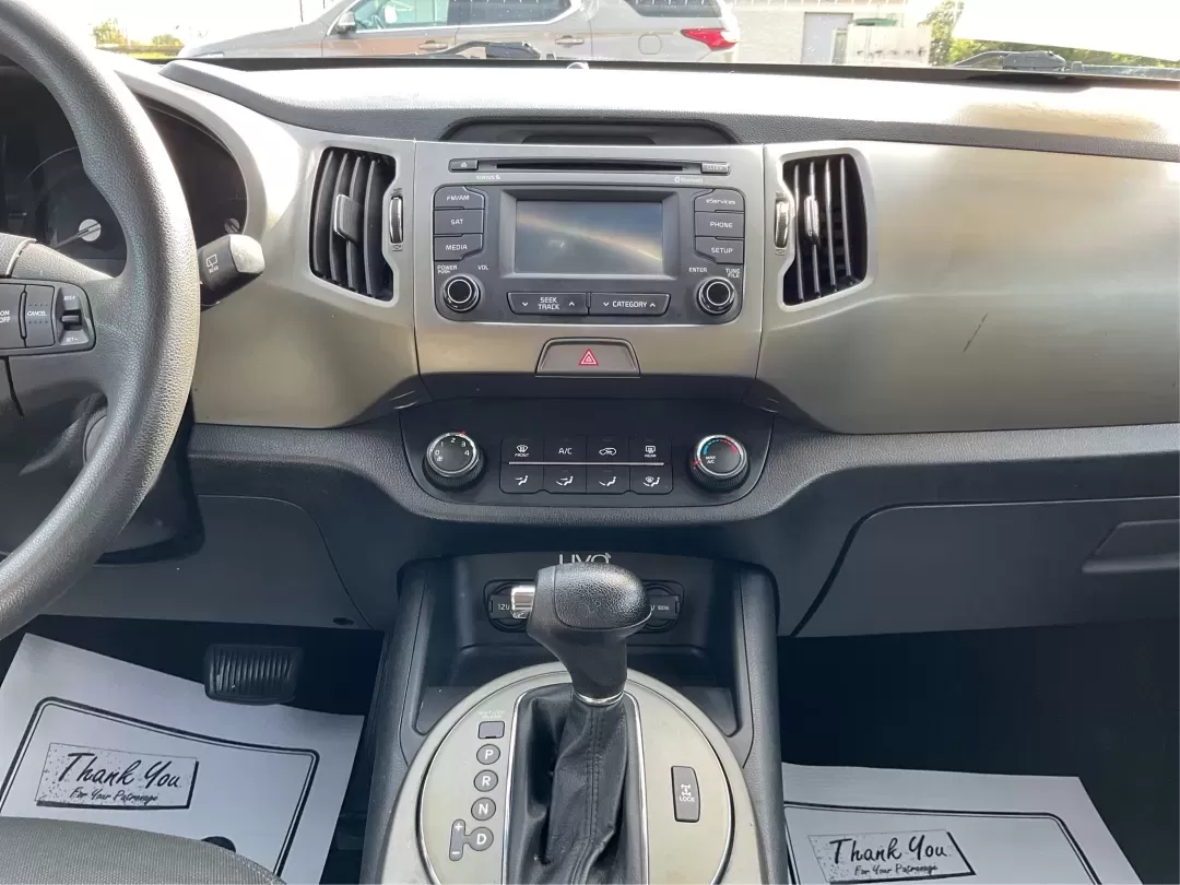 2015 Kia Sportage LX (KNDPBCAC2F7) with an Other engine, located at 401 Woodman Dr, Riverside, OH, 45431, (937) 908-9800, 39.760899, -84.123421 - Are you ready to elevate your driving experience and embark on unforgettable adventures? Look no further than this 2015 Kia Sportage LX, perfect for those who crave a reliable crossover that blends style with versatility. Whether you're commuting to work, shuttling the kids to school, or planning a - Photo#12