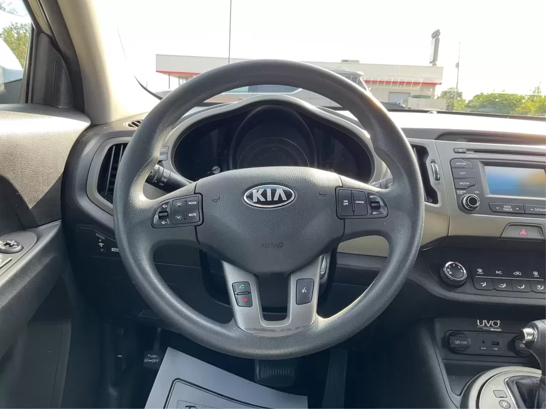 2015 Kia Sportage LX (KNDPBCAC2F7) with an Other engine, located at 401 Woodman Dr, Riverside, OH, 45431, (937) 908-9800, 39.760899, -84.123421 - Are you ready to elevate your driving experience and embark on unforgettable adventures? Look no further than this 2015 Kia Sportage LX, perfect for those who crave a reliable crossover that blends style with versatility. Whether you're commuting to work, shuttling the kids to school, or planning a - Photo#15