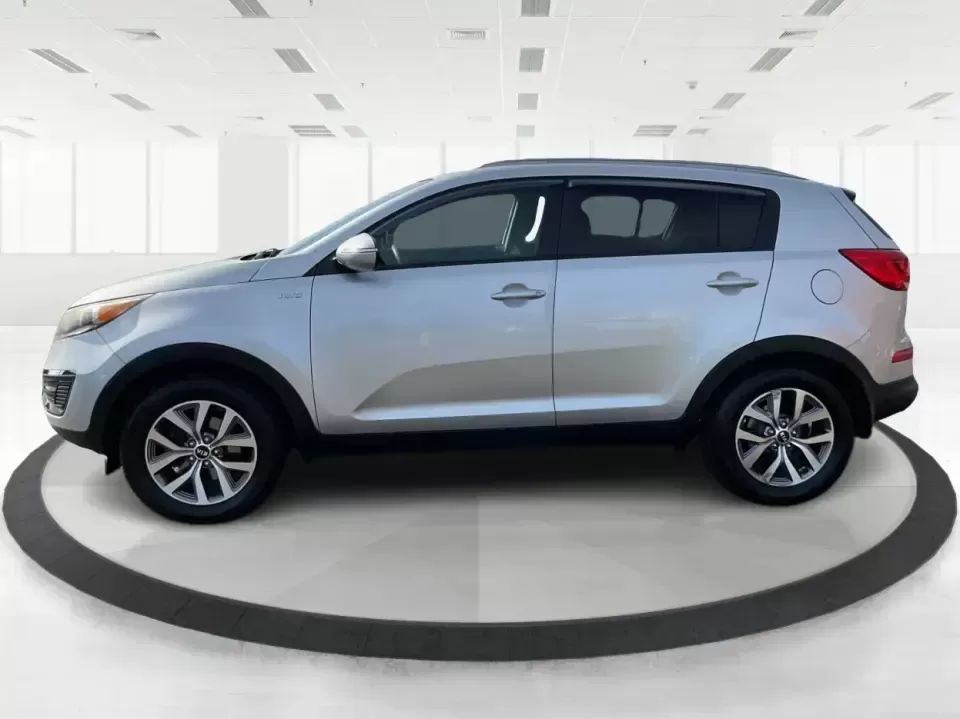 2015 Kia Sportage LX (KNDPBCAC2F7) with an 2.4L V6 DOHC 24V engine, 6-Speed Automatic transmission, located at 1099 N County Rd 25A , Troy, OH, 45373, (937) 908-9800, 40.057079, -84.212883 - Are you ready to elevate your driving experience and embark on unforgettable adventures? Look no further than this 2015 Kia Sportage LX, perfect for those who crave a reliable crossover that blends style with versatility. Whether you're commuting to work, shuttling the kids to school, or planning a - Photo#5