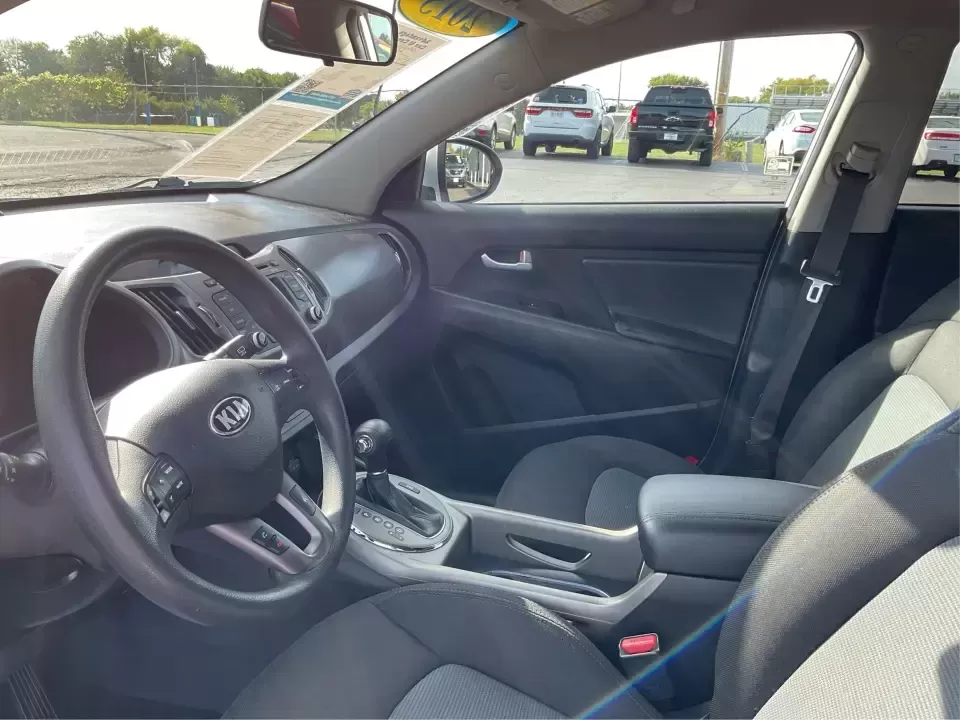 2015 Kia Sportage LX (KNDPBCAC2F7) with an 2.4L V6 DOHC 24V engine, 6-Speed Automatic transmission, located at 1099 N County Rd 25A , Troy, OH, 45373, (937) 908-9800, 40.057079, -84.212883 - Are you ready to elevate your driving experience and embark on unforgettable adventures? Look no further than this 2015 Kia Sportage LX, perfect for those who crave a reliable crossover that blends style with versatility. Whether you're commuting to work, shuttling the kids to school, or planning a - Photo#9