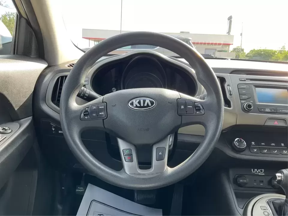 2015 Kia Sportage LX (KNDPBCAC2F7) with an 2.4L V6 DOHC 24V engine, 6-Speed Automatic transmission, located at 4508 South Dixie Dr, Moraine, OH, 45439, (937) 908-9800, 39.689976, -84.218452 - Are you ready to elevate your driving experience and embark on unforgettable adventures? Look no further than this 2015 Kia Sportage LX, perfect for those who crave a reliable crossover that blends style with versatility. Whether you're commuting to work, shuttling the kids to school, or planning a - Photo#16