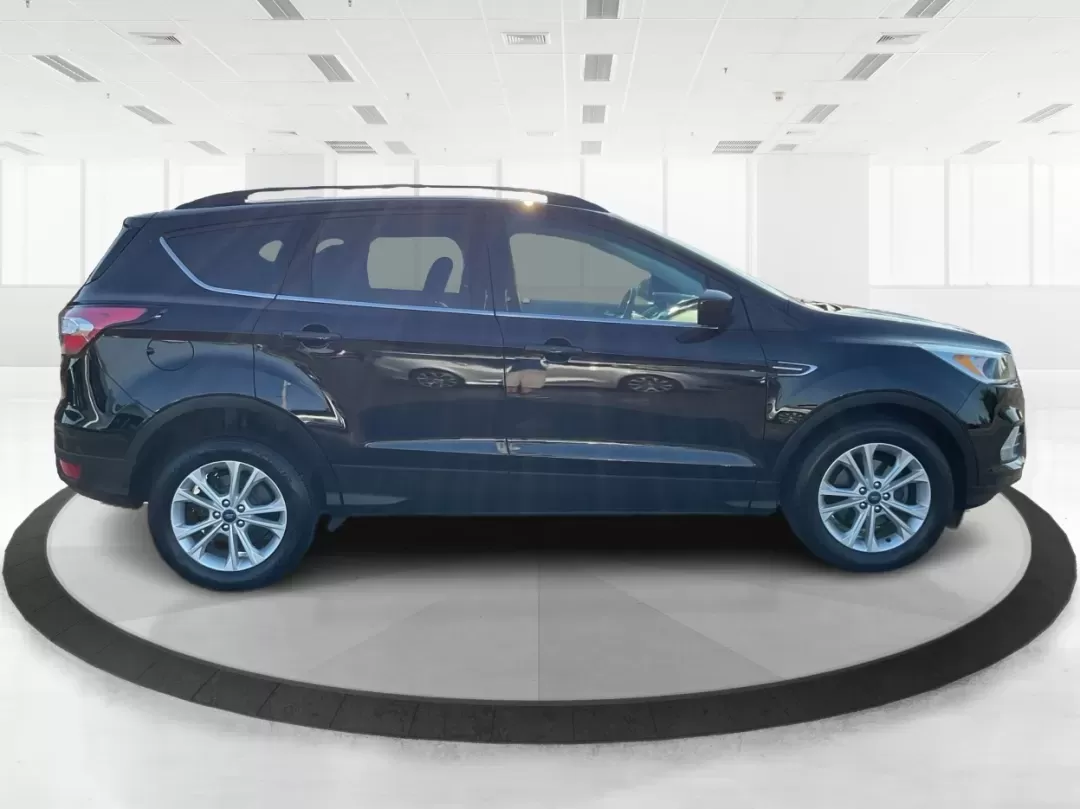 2018 Ford Escape SE (1FMCU0GD6JU) with an Other engine, located at 1184 Kauffman Ave, Fairborn, OH, 45324, (937) 908-9800, 39.807072, -84.030914 - Experience adventure and comfort on the open road with the 2018 Ford Escape SE, available now at Advantage Car and Credit in Vandalia, OH. This versatile SUV is perfect for families, outdoor enthusiasts, and commuters alike, providing a seamless blend of style, safety, and functionality. With plenty - Photo#1