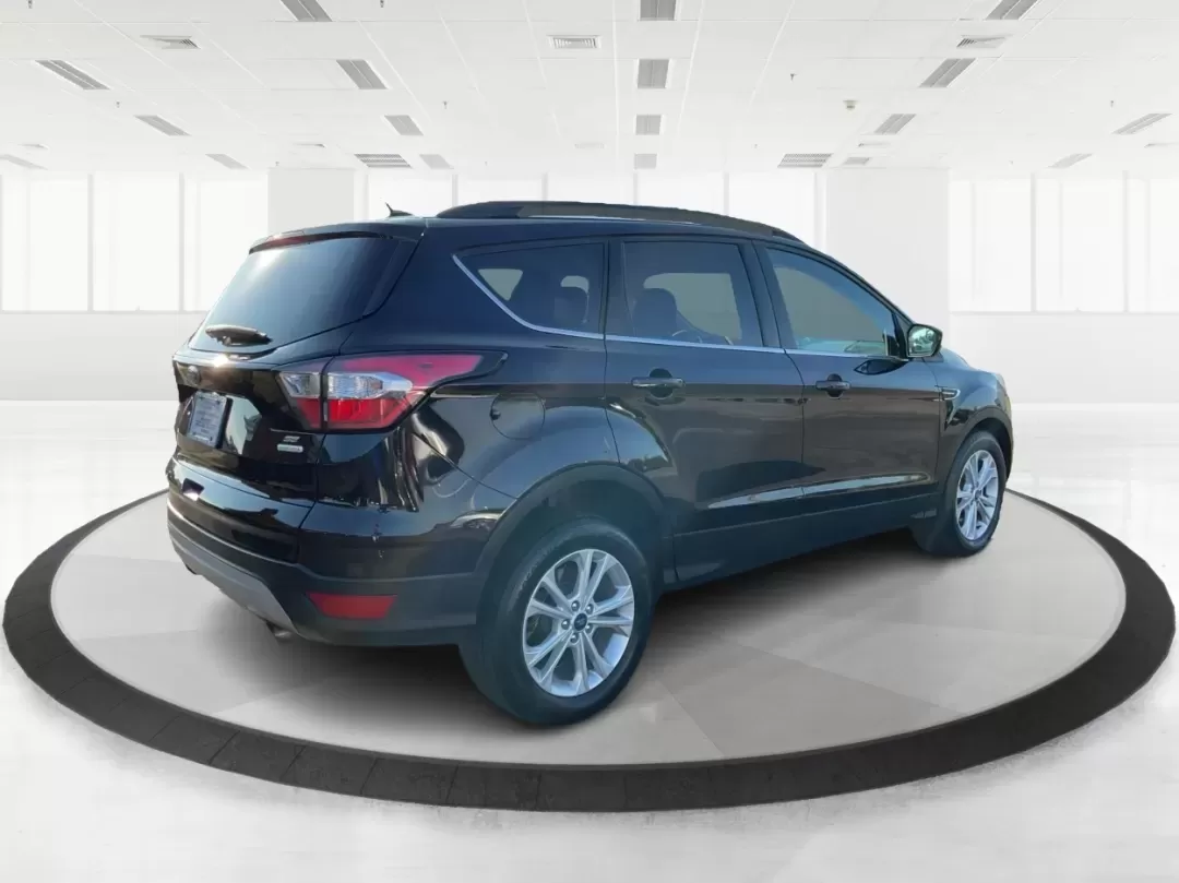 2018 Ford Escape SE (1FMCU0GD6JU) with an Other engine, located at 1184 Kauffman Ave, Fairborn, OH, 45324, (937) 908-9800, 39.807072, -84.030914 - Experience adventure and comfort on the open road with the 2018 Ford Escape SE, available now at Advantage Car and Credit in Vandalia, OH. This versatile SUV is perfect for families, outdoor enthusiasts, and commuters alike, providing a seamless blend of style, safety, and functionality. With plenty - Photo#2
