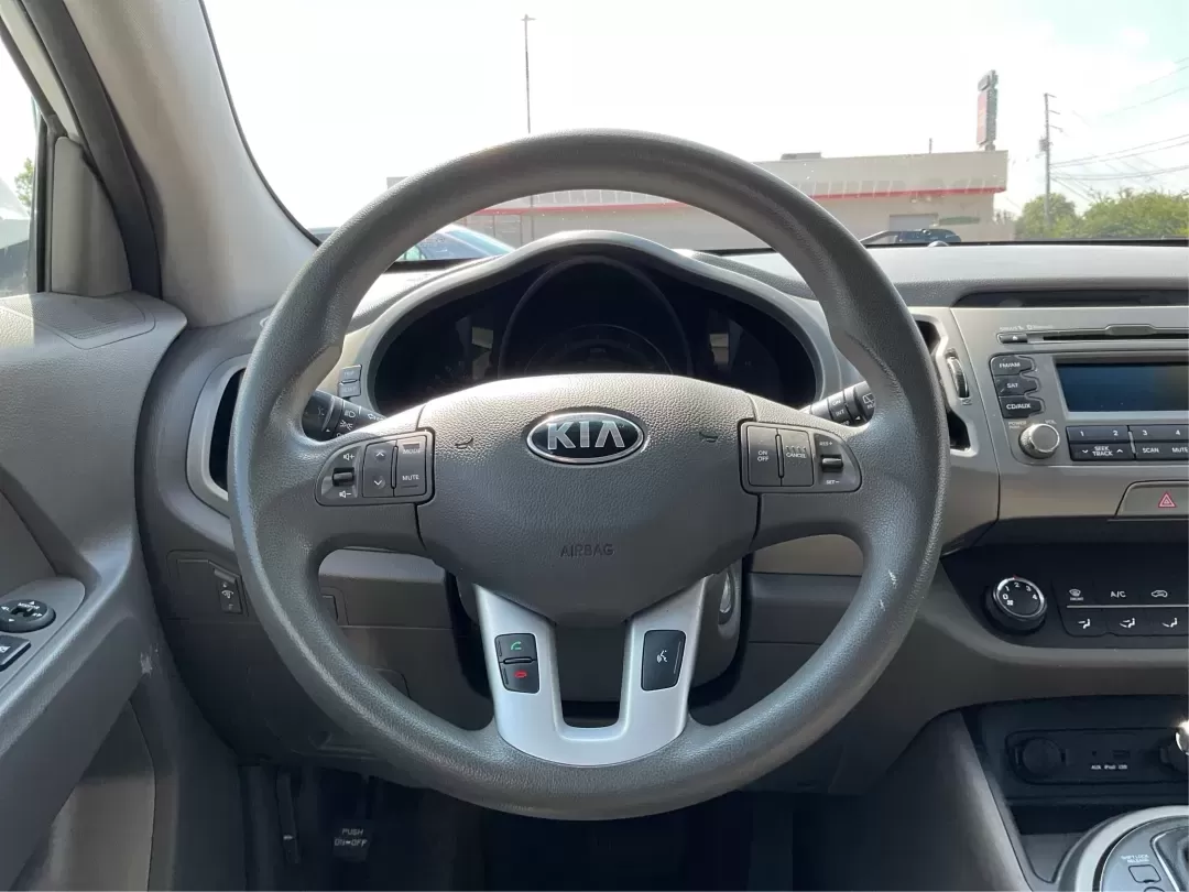 2013 Kia Sportage LX (KNDPBCA26D7) with an 2.4L I-4 DOHC engine, located at 4508 South Dixie Dr, Moraine, OH, 45439, (937) 908-9800, 39.689976, -84.218452 - Experience the ultimate blend of versatility and comfort with this 2013 Kia Sportage LX, perfect for families on the go, urban commuters, or those planning outdoor weekend adventures. This reliable crossover's spacious interior and dynamic performance make it an ideal choice for drivers seeking a de - Photo#15