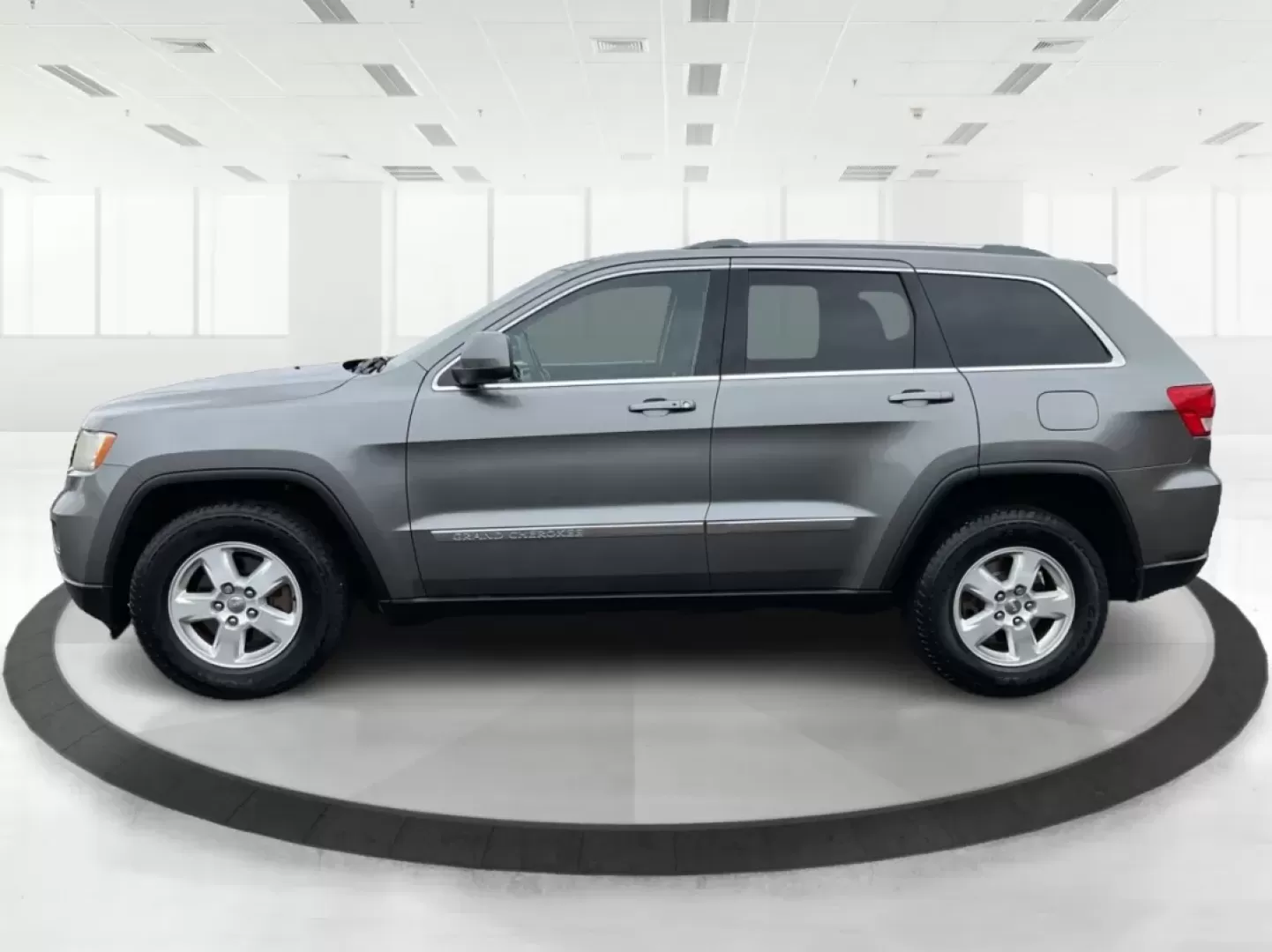 2012 Jeep Grand Cherokee Laredo (1C4RJFAG2CC) with an Other engine, located at 8750 N County Rd 25A, Piqua, OH, 45356, (937) 908-9800, 40.164391, -84.232513 - ### Discover Adventure with the 2012 Jeep Grand Cherokee Laredo at Advantage Car and Credit - Piqua<br /> <br /> Are you ready to tackle your next adventure, whether it's a weekend getaway or daily commutes through Piqua's scenic routes? The 2012 Jeep Grand Cherokee Laredo is the perfect SUV for tho - Photo#5
