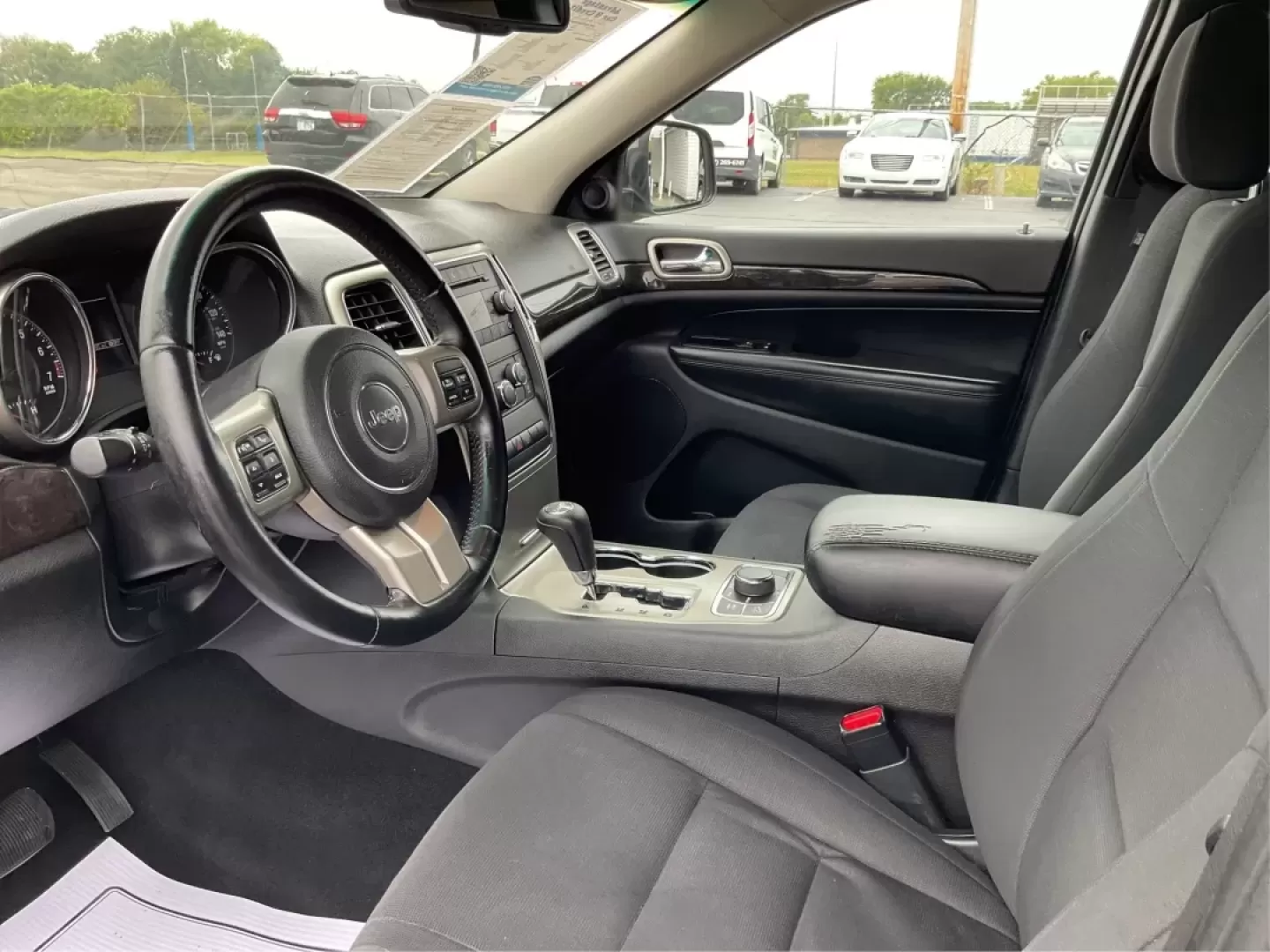 2012 Jeep Grand Cherokee Laredo (1C4RJFAG2CC) with an Other engine, located at 8750 N County Rd 25A, Piqua, OH, 45356, (937) 908-9800, 40.164391, -84.232513 - ### Discover Adventure with the 2012 Jeep Grand Cherokee Laredo at Advantage Car and Credit - Piqua<br /> <br /> Are you ready to tackle your next adventure, whether it's a weekend getaway or daily commutes through Piqua's scenic routes? The 2012 Jeep Grand Cherokee Laredo is the perfect SUV for tho - Photo#9