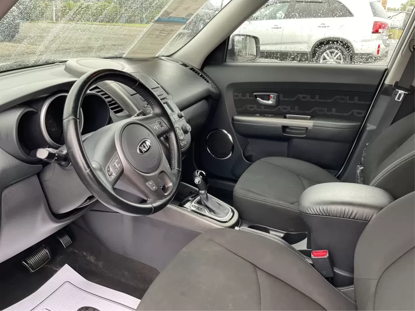 2013 Kia Soul + (KNDJT2A6XD7) with an 2.0L L4 DOHC 16V engine, Automatic transmission, located at 880 E. National Road, Vandalia, OH, 45377, (937) 908-9800, 39.891918, -84.183594 - **Elevate Your Everyday with the 2013 Kia Soul Perfect for the Modern Lifestyle!**<br /> <br /> Are you ready to embrace a vehicle that effortlessly fits into your busy life? The 2013 Kia Soul is your ideal companion, whether you're a growing family needing a reliable ride, a commuter seeking comfo - Photo#9