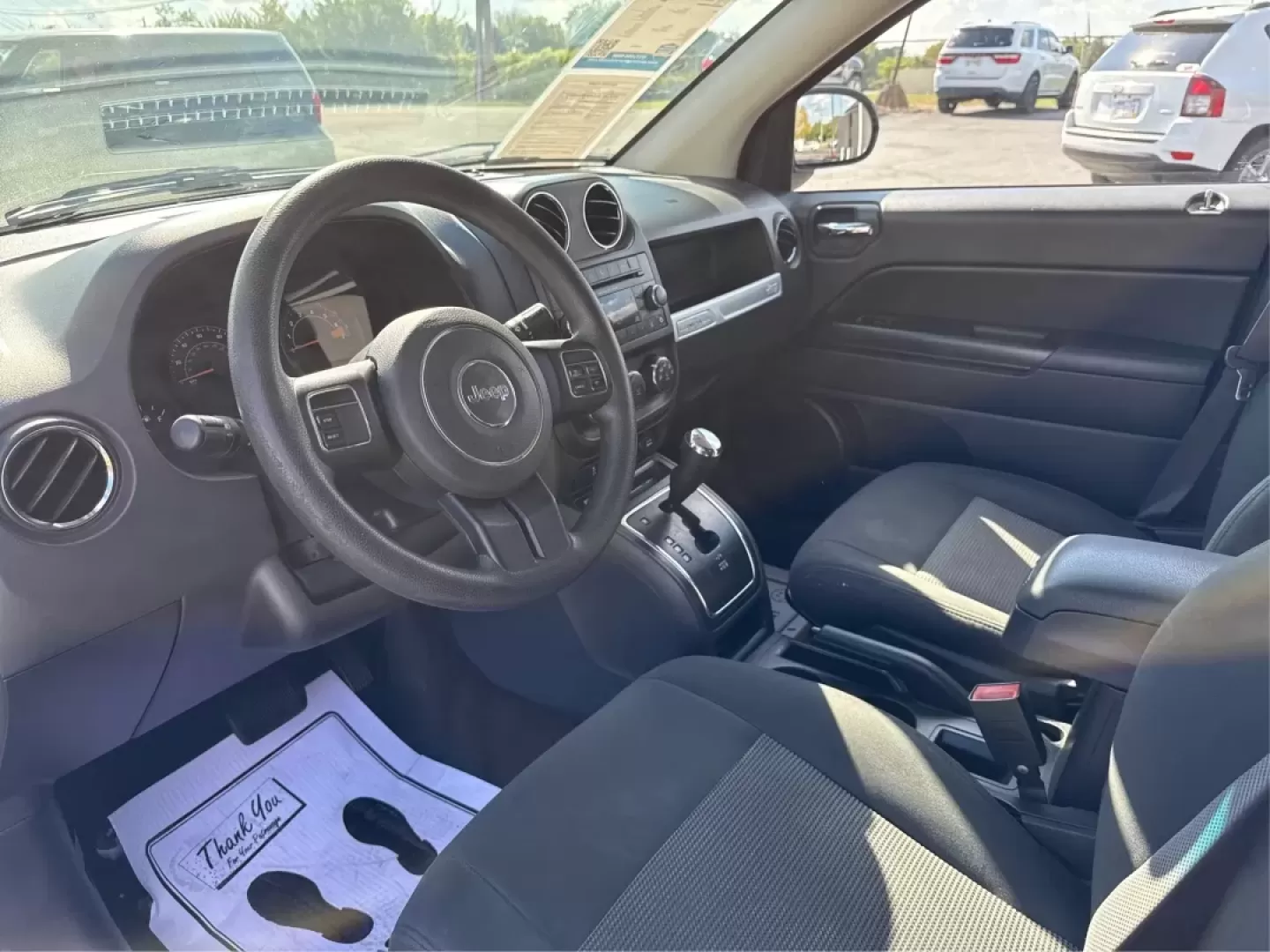 2016 Jeep Compass Sport (1C4NJCBA6GD) with an Other engine, located at 880 E. National Road, Vandalia, OH, 45377, (937) 908-9800, 39.891918, -84.183594 - **Adventure Awaits: Discover the 2016 Jeep Compass Sport at Advantage Car and Credit!**<br /> <br /> Are you ready to embrace the open road and tackle weekend adventures? Look no further than the 2016 Jeep Compass Sport, a versatile SUV that fits seamlessly into your active lifestyle. Whether you're - Photo#9