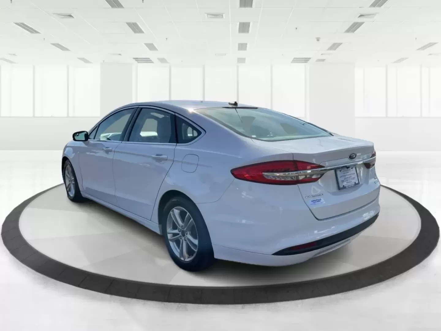 2018 Ford Fusion SE (3FA6P0HD4JR) with an Other engine, located at 8750 N County Rd 25A, Piqua, OH, 45356, (937) 908-9800, 40.164391, -84.232513 - **Experience the Perfect Blend of Comfort and Style with this 2018 Ford Fusion SE at Advantage Car and Credit Piqua!**<br /> <br /> Are you searching for a reliable sedan that combines comfort, tech features, and a sleek design? Look no further than this stunning **2018 Ford Fusion SE**! This car i - Photo#4